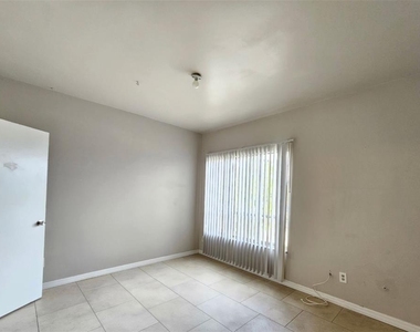 7610 W Powhatan Avenue - Photo Thumbnail 17
