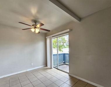 7610 W Powhatan Avenue - Photo Thumbnail 7