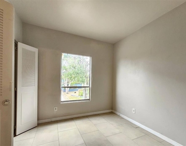 7610 W Powhatan Avenue - Photo Thumbnail 15