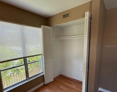 7610 W Powhatan Avenue - Photo Thumbnail 6