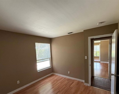 7610 W Powhatan Avenue - Photo Thumbnail 7