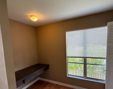 7610 W Powhatan Avenue - Photo Thumbnail 5