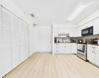 1411 E 109th Avenue - Photo Thumbnail 2