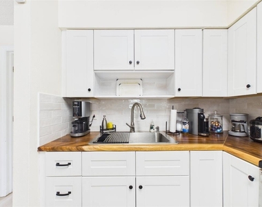 1411 E 109th Avenue - Photo Thumbnail 3