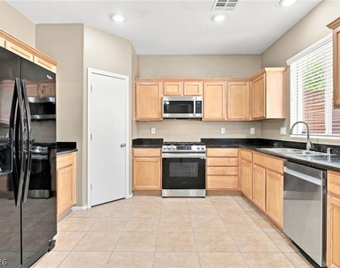 11240 Woodland Violet Avenue - Photo Thumbnail 8