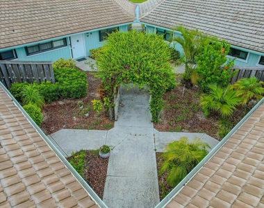 1127 E Seminole Avenue E - Photo Thumbnail 2