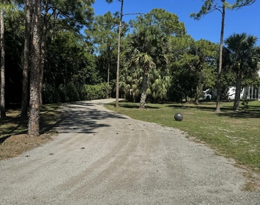 14161 Caloosa Boulevard - Photo Thumbnail 2