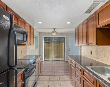 1237 N 84th Place - Photo Thumbnail 4