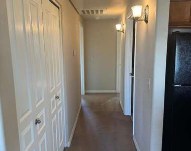 1117 E 8th Street - Photo Thumbnail 4
