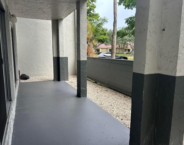 4108 N Pine Island Road - Photo Thumbnail 9