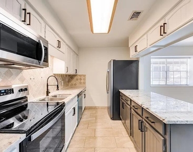 4919 Woodland Park Boulevard - Photo Thumbnail 5