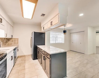 4919 Woodland Park Boulevard - Photo Thumbnail 3