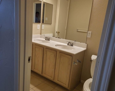 8704 Hunters Creek Drive - Photo Thumbnail 6