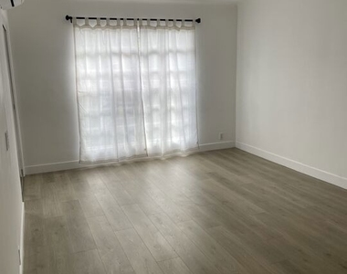 1254 N Orange Grove Avenue - Photo Thumbnail 1