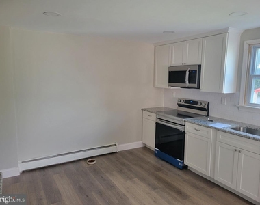 130 E 8th Avenue - Photo Thumbnail 2