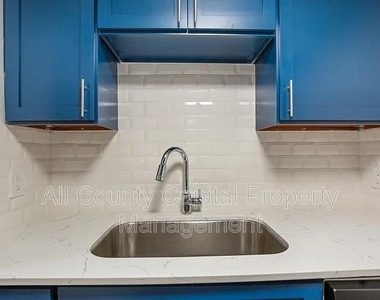 502 W 35th St - Photo Thumbnail 6