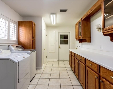 12504 Silver Spur Rd - Photo Thumbnail 9