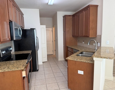 2410 Great Oaks Dr - Photo Thumbnail 6
