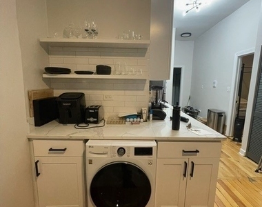 1112 W 18th Street - Photo Thumbnail 2