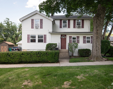 220 E 15th Street - Photo Thumbnail 1