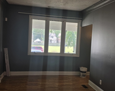 232 W 111th Place - Photo Thumbnail 1