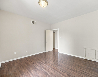 7443-7445 S Paxton Avenue - Photo Thumbnail 12