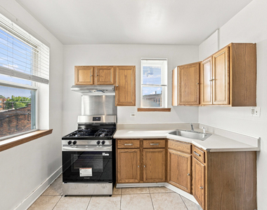 7443-7445 S Paxton Avenue - Photo Thumbnail 3