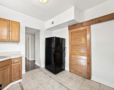 7443-7445 S Paxton Avenue - Photo Thumbnail 5