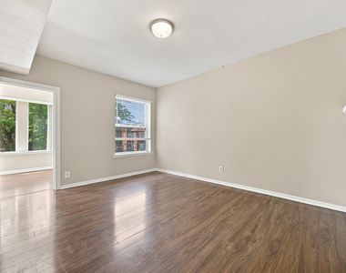 7443-7445 S Paxton Avenue - Photo Thumbnail 1
