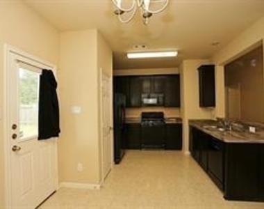 10011 Cobbs Cove Lane - Photo Thumbnail 3