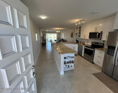 8777 Warwick Drive - Photo Thumbnail 4