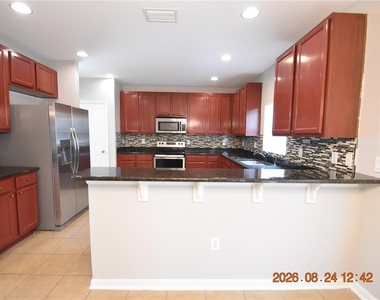 11405 Flora Springs Drive - Photo Thumbnail 12