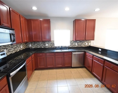 11405 Flora Springs Drive - Photo Thumbnail 13