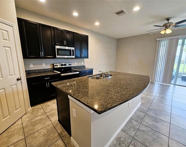 7115 Grand Elm Drive - Photo Thumbnail 9