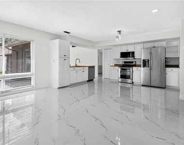 6747 Deer Pond Lane N - Photo Thumbnail 3