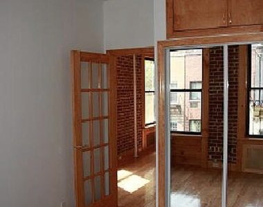 324 East 52nd Street - Photo Thumbnail 3