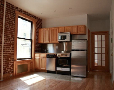 324 East 52nd Street - Photo Thumbnail 1