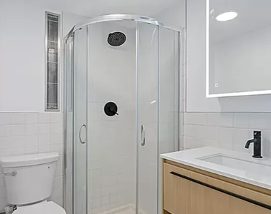 66 Devoe St - Photo Thumbnail 9