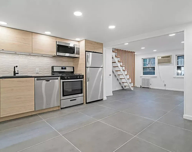 66 Devoe St - Photo Thumbnail 6