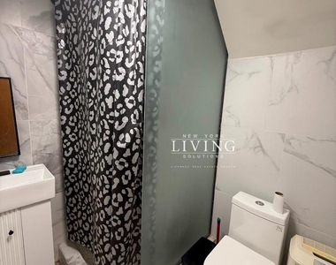 6818 Avenue L - Photo Thumbnail 2