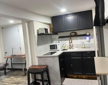 6818 Avenue L - Photo Thumbnail 4