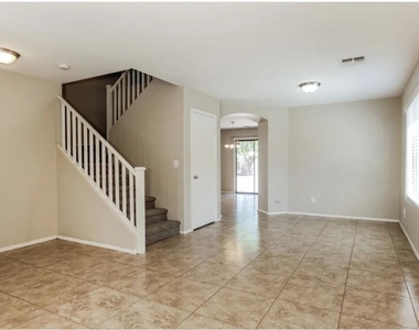 15986 W Durango Street - Photo Thumbnail 2