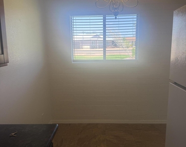 7001 E Wilshire Drive - Photo Thumbnail 7