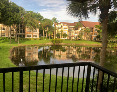 8781 Wiles Road - Photo Thumbnail 6