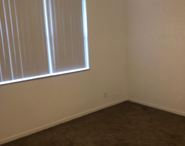 8781 Wiles Road - Photo Thumbnail 4