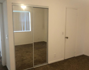 8781 Wiles Road - Photo Thumbnail 5