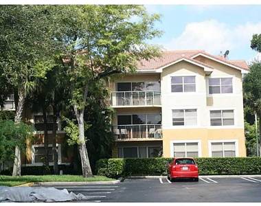 8781 Wiles Road - Photo Thumbnail 2