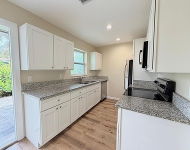 8748 Sunset Drive - Photo Thumbnail 14