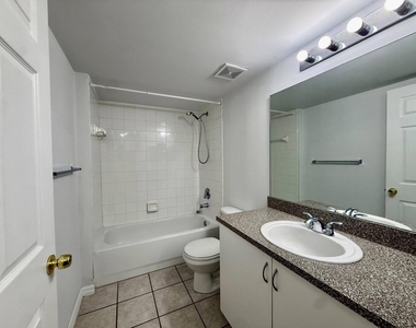 5041 Wiles Road - Photo Thumbnail 2