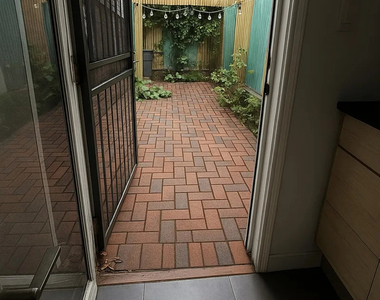 66 Devoe St - Photo Thumbnail 4